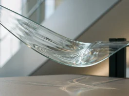 Conceptual close-up of a flexible display material bending.