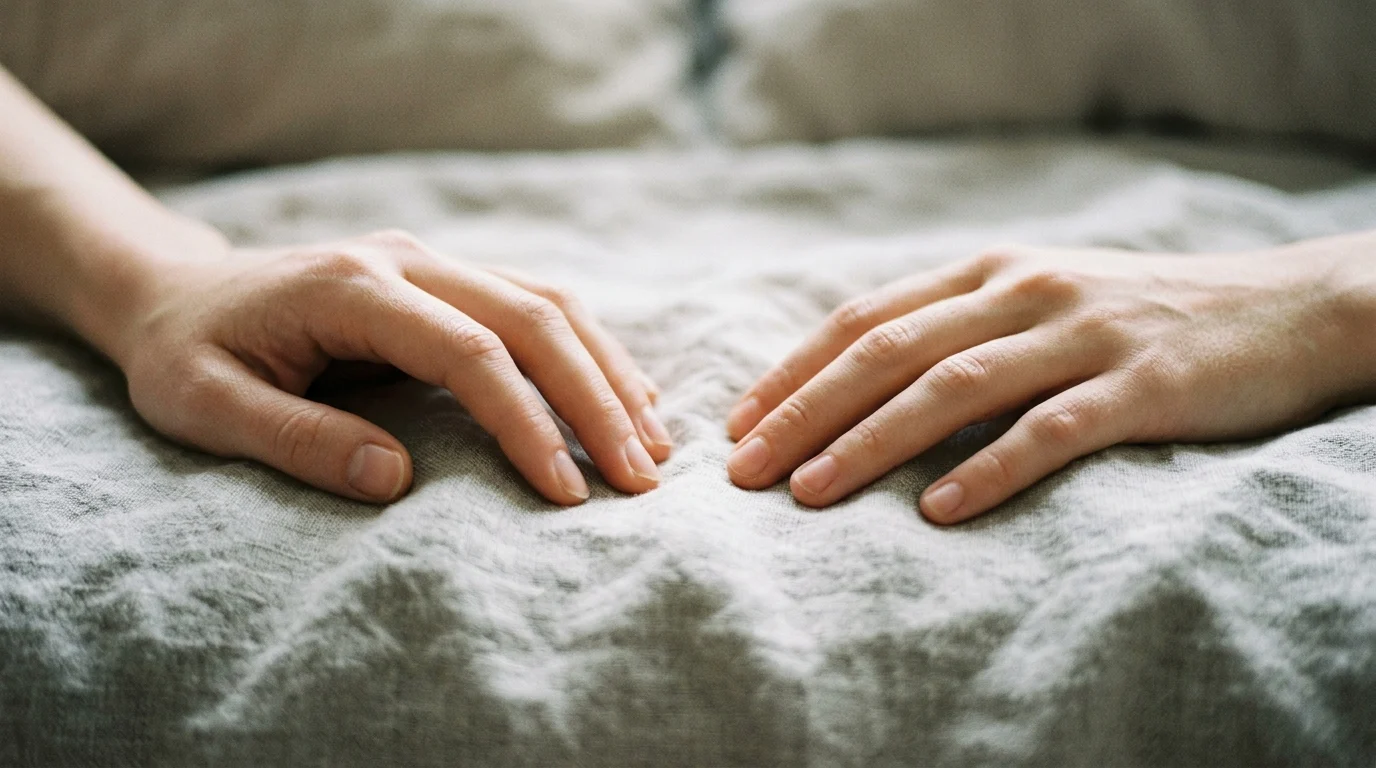 Close-up of two hands on a linen background representing personal space