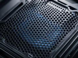 A close-up conceptual view of high-density cooling vents on a metallic workstation chassis.