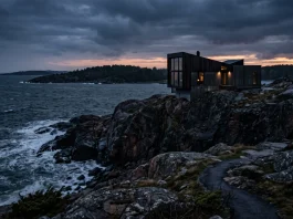 Gustaf Skarsgård Films Directorial Debut ‘The Cannibal’ at Ingmar Bergman’s Fårö Estate A moody coastal landscape on with a secluded house at dusk.